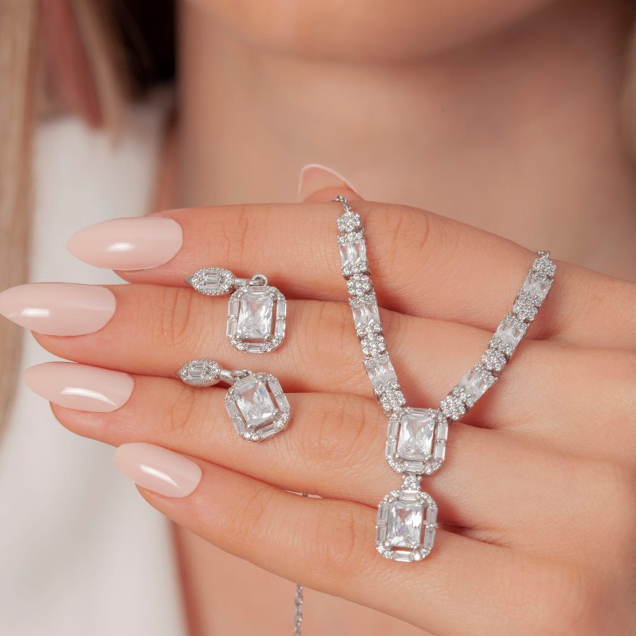 Stone,Diamond,Jewelry,Set,In,White,Outfit,Lady,Hands